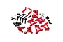 A collection of red anodized aluminium RC car upgrade parts for Tamiya TT-02, including suspension arms, steering knuckles, and drive shafts.