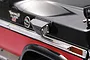A black GPM Racing fender vent accessory installed on the side of a black and red Traxxas TRX-4 Ford Bronco RC body shell.
