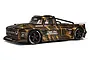 ARRMA Infraction 6S BLX 1/7 scale RC street basher truck in a brown and black camouflage paint scheme, viewed from a side-angle on a white background.