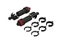 Two ARRMA front big bore shock absorbers with black bodies, red caps, and six black plastic spring preload spacers on a white background.