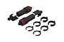 Two ARRMA rear big bore shock absorbers with black bodies, red adjustment collars, and a set of six black plastic spring preload spacers.