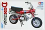 Tamiya 1/6 scale Honda Dax Export ST70 motorcycle plastic model kit box art showing a red mini bike.