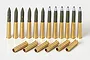 A set of 1/35 scale model brass 75mm projectiles and empty shell casings for a Tamiya M4 Sherman tank model kit.