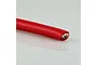 A close-up view of a thick red silicone-insulated electrical wire showing the stranded metal core at the cut end.