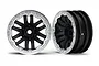 Two Traxxas TRX-4 1.9-inch crawler wheels with black spokes and satin chrome beadlock-style rings, shown against a white background.