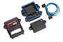 Traxxas TQi Telemetry Expander 2.0 module with its housing, cover, and connection cable on a white background.