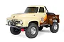 Axial SCX10 II 1955 Ford F-100 RC rock crawler in a two-tone cream and brown paint scheme with off-road tires and a roll bar.