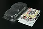 Tamiya 1/10 scale clear polycarbonate Nismo Coppermix Silvia RC car body shell with included decal sheets and chrome plastic light buckets.