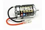A Tamiya RS-540 Sport Tuned brushed motor with a chrome finish, black and red wires, and bullet connectors against a white background.