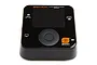 Spektrum S1200 Smart Charger unit with a black glossy finish, digital display, and central control dial on a white background.