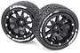 Two Louise 3.3 inch ST-Rocket MFT RC stadium truck tyres mounted on black beadlock-style wheels against a white background.