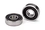 Two Traxxas rubber-shielded ball bearings shown against a plain white background.