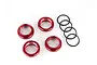 Four red anodized aluminium shock adjusting nuts and four black rubber O-rings for Traxxas GT-Maxx shocks.