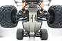 Low angle view of a Traxxas Maxx RC truck chassis featuring installed GPM stainless steel skid plates on the front and underbody.