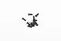 A small pile of ten black metal button head screws for RC models against a plain white background.