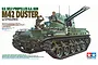 Box art for Tamiya 1/35 scale M42 Duster self-propelled anti-aircraft gun model kit showing the tank with crew figures.