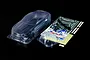 Unpainted clear polycarbonate RC car body shell for a Ford Mustang GT4 with included decal sheet, window masks, and plastic side mirror parts.