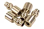 Four small metallic pivot balls for RC cars arranged in a cluster against a white background.
