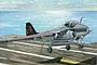 Box art illustration of a grey A-6E Intruder jet aircraft on an aircraft carrier deck with a blue ocean and sky background.