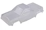 An unpainted, clear polycarbonate RC truck body shell for a 1/10 scale crawler, viewed from a high angle.