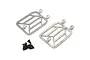 Two stainless steel front light grill covers for an RC crawler with a small pile of black mounting screws on a white background.