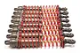A set of eight Traxxas Big-Bore aluminium shock absorbers with red springs and gunmetal grey bodies, arranged in a row against a white background.