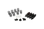 A set of four black aluminium RC shock absorbers with extra springs, mounting hardware, and spacers on a white background.