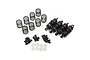 A set of four Yeah Racing 50mm big bore RC shock absorbers with black and dark red components, including extra springs, ball ends, and plastic spacers.