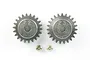 Two Tamiya metal pinion gears, one with 22 teeth and one with 23 teeth, accompanied by two small grub screws on a white background.