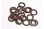 A pile of twenty small, flat, brown PTFE-coated washers scattered on a white surface.