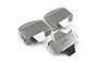 Three stainless steel differential skid plates for an RC vehicle, each featuring the Yeah Racing logo etched into the metal surface.