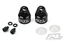 Two black aluminum Pro-Line PowerStroke shock caps with matching rubber seals and washers on a white background.
