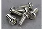 A close-up view of six silver-coloured metal binder head screws with Phillips drive heads arranged on a grey surface.