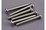 A close-up view of five silver metal binder head screws arranged in a cluster on a grey surface.