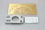 A photo-etched brass fret, a grey plastic tank hull top, and a decal sheet for the Trumpeter 1/35 German Ostwind model kit.
