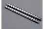Two shiny, silver-coloured metal shock shafts for Traxxas RC vehicles, shown side-by-side on a grey surface.