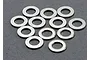 A collection of twelve small, circular silver-coloured steel washers arranged on a dark grey surface.