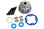 Traxxas aluminium differential case set including a grey metal housing, four black screws, metal shims, and blue rubber seals on a white background.