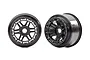 Two black Traxxas Maxx 4S RC car rims shown from front and angled perspectives against a white background.