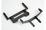 Two black plastic RC car body mounts for Traxxas vehicles, shown from an overhead angle against a plain white background.