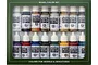 A Vallejo Model Color paint set in a green cardboard box containing 16 individual 17ml dropper bottles of acrylic paint for scale models.