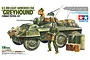 Box art for Tamiya 1/35 scale U.S. M8 Greyhound Light Armored Car model kit, featuring an illustration of the vehicle with soldiers and accessories.