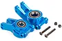 A pair of blue anodized aluminium rear hubs for an RC car, including pre-installed bearings, two screws, and two lock nuts.