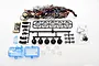 G.T. Power LED light kit for TRX-4 Land Rover Defender including circuit board, wiring harness, plastic light buckets, lenses, and mounting hardware.