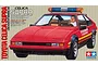 Box art for Tamiya 1/24 scale Toyota Celica Supra Long Beach GP Marshal Car model kit, featuring a red sports car with a light bar.