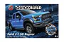 Airfix Quickbuild Ford F-150 Raptor model kit box art showing a blue pickup truck on a rocky terrain background.