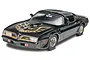 A 1/25 scale model of a black 1977 Pontiac Firebird from Smokey and the Bandit, featuring the iconic gold hood bird decal and gold snowflake wheels.