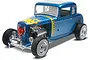 A 1/25 scale model of a blue 1932 Ford 5-window coupe hot rod with flame decals and a devil graphic on the grille.