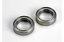 Two metal shielded ball bearings shown from a top-down angle on a white background.