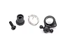 Traxxas TRX-6 differential locking servo horn assembly parts including a black plastic horn, metal spring, screw, and bushing on a white background.